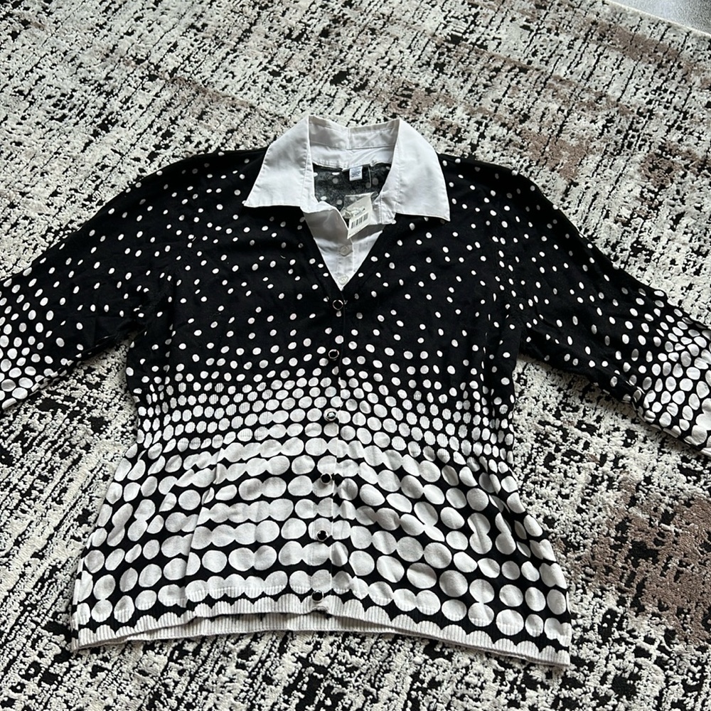 Kim Rogers black and white sweater